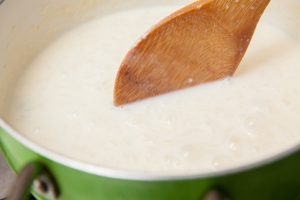 Rice Pudding With Cinamon And Raisins Preparation : Cooked Rice With Added Milk